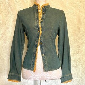 Denim corset style blouse with cream lace trimming.